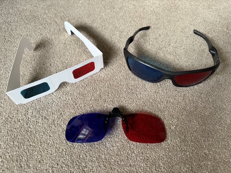 Various pairs of 3D anaglyph glasses